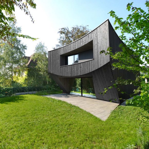 Изогнутый дом в Швейцарии от Daluz Gonzalez Architekten.