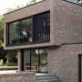 Кирпичный модернистский дом в Англии