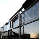 The Left-Over-Space House в Австралии от Cox Rayner Architects.