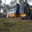 Чёрный лесной дом в Литве