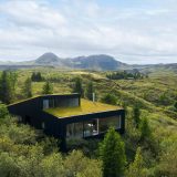 Дом для загородного отдыха с зелёной крышей