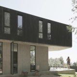 Загородный дом из бетона и дерева в Чили